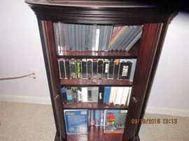Beautiful wood roll front storage for cds/dvds