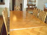 12' R.J. Horner style parquet dining table, solid oak. This table includes 2 hidden leaves.