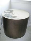This table is a piece of art! Brass base with artistic design on top.