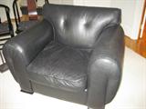 There are two of these leather chairs.