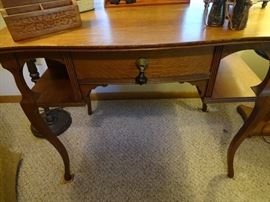 Close-up of antique oak desk.