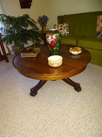 Antique round oak table (cut down for a coffee table).