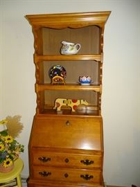 Small maple secretary with bookcase top.