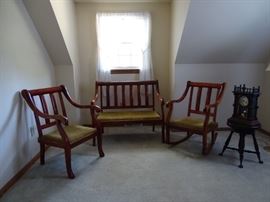 Antique three piece parlor set, piano stool & clock..