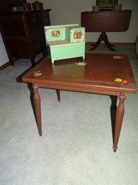 Child's metal table & toy stove.
