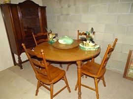 Maple dinette set with four chairs.