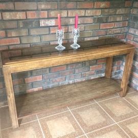 Long vintage console table and other assorted tables.