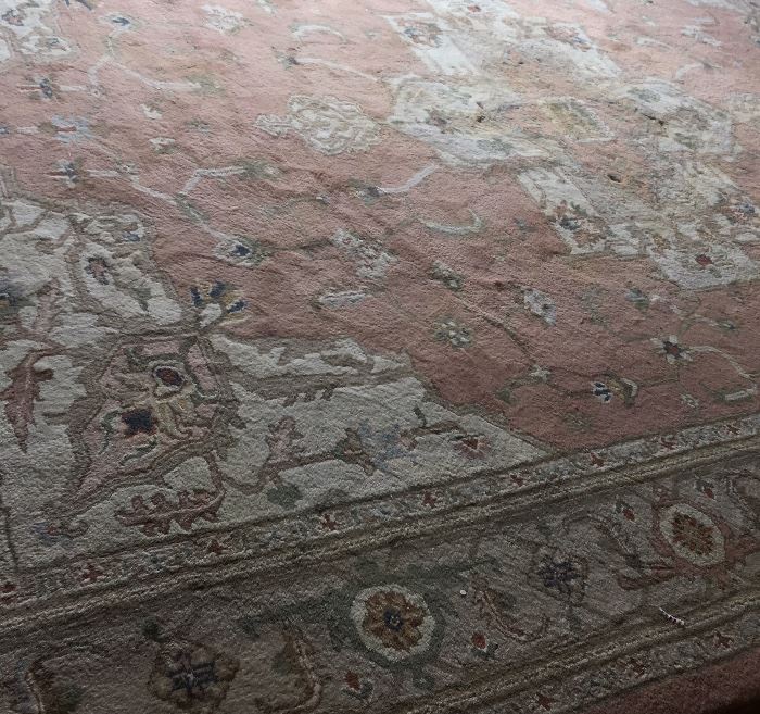 Large vintage area rug--light and pastel colors.