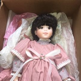Assorted vintage and contemporary dolls, some new in boxes.