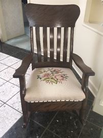 Nice antique rocking chair with needlepoint seat.