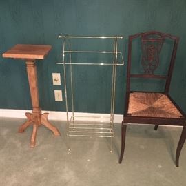 Assorted tables, stands and chairs.