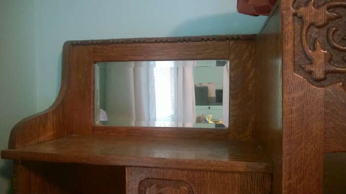 Old Secretary Cabinet needs a little TLC but is very nice and has a beveled mirror.