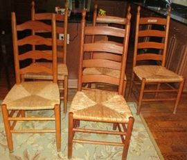Although only a few are pictured, there are approximately 20 matching chairs available