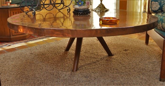 Round copper top coffee table