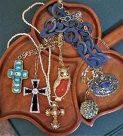 Assortment of necklaces with pendants