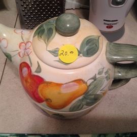 ceramic tea pot on top of cup as a set ($20.00)