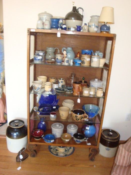 Shadowlawn pottery and other makers, display shelf with beveled glass sides