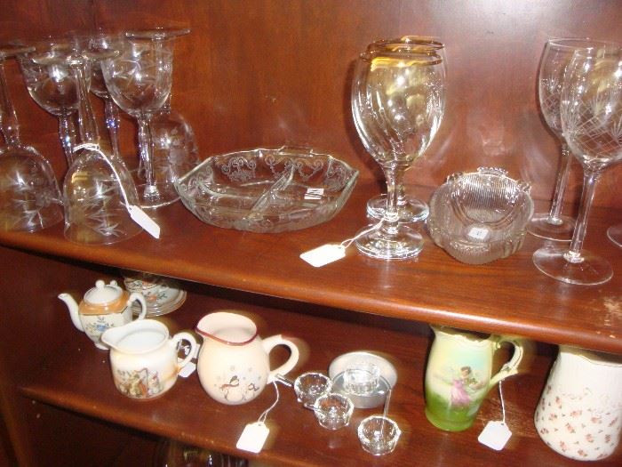 Small pitchers, salts, blown glass wine glasses, dishes.