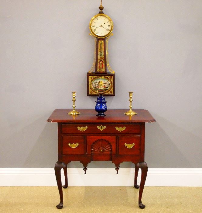 18th c American Mahogany lowboy w/carved fan, Banjo clock w/original "Perry's Victory" eglomise glasses, 18th c Candlesticks, Cobalt Blue covered sugar