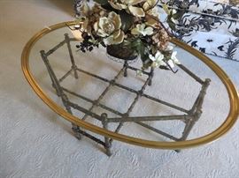 Oval Brass Glass & Faux Bamboo Coffee Table
Baker Furniture Company
