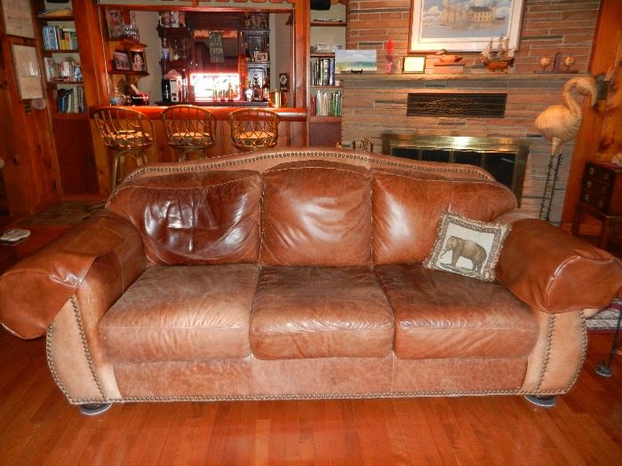 Leather couch (part of set with love seat, chair, and ottoman)