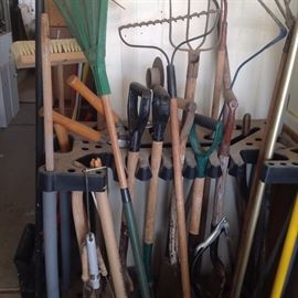 Lots of gardening tools and gardening tool holder