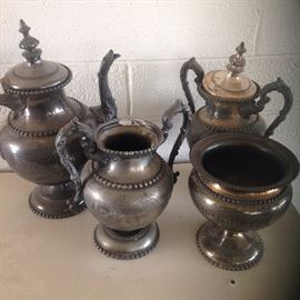 Assorted pitchers and urns/sugar bowls