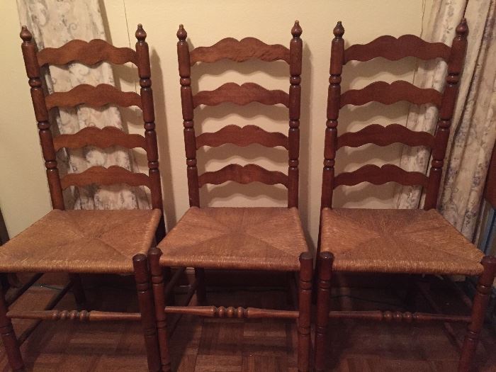Ladder back chairs with rushed seats. In great vintage shape
