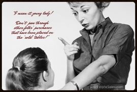 Only schmos try to peruse items on the sold tables, so we pay one staff member just to watch these items and thus protect them from those predatory types who have no freaking manners.