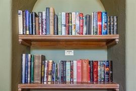 Individually priced books will be in the breakfast room. Common books will be in the library, which will be just to your right as you enter this Fairview Farm home.