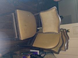 These vintage chairs fold up