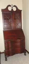 Drop front desk - secretary with bookcase above.