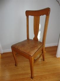 One of the oak dining room chairs.