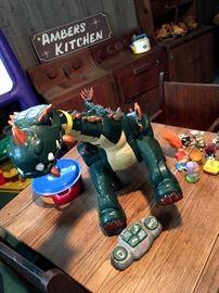 Some kids toys, bikes, and a cool kitchen set!...