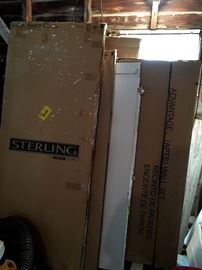 Speaking of new in the box...We're loaded! Need a shower surround? Glass Doors?....