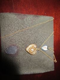 THERE IS A LARGE ASSORTMENT OF JEWELRY