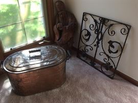 Antique washtub and wrought iron gate 