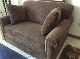 Plush upholstered chair and a half