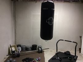 TKO punching bag plus other assorted exercise equipment