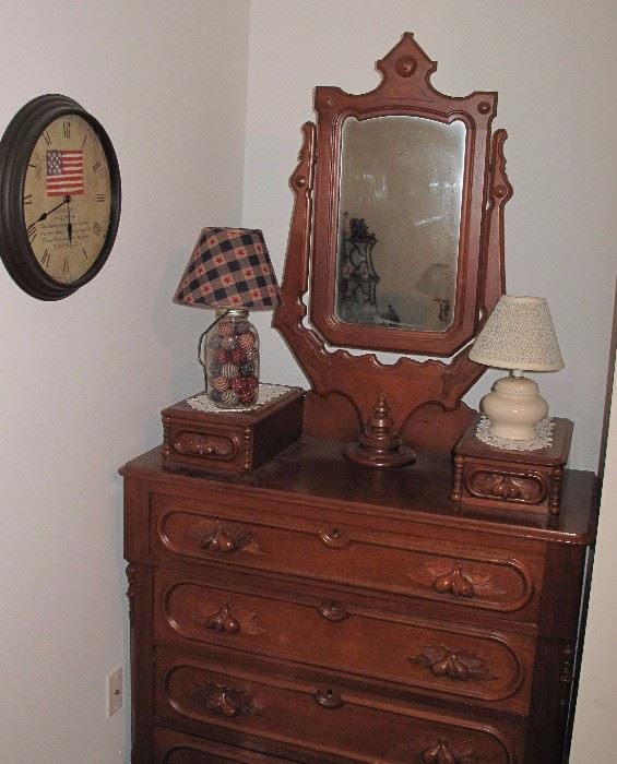 Walnut victorian dresser with wishbone mirror.