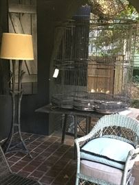 Huge bird cage and antique wicker