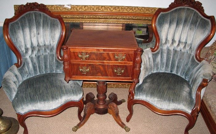 Formal two drawer stand. Pair of Victorian style upholstered chairs. Very large wall mirror behind.