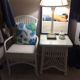 White wicker chair and side table; Vogue framed picture