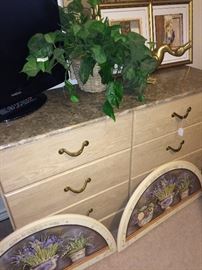 Six drawer dresser has matching chest and nightstand; arched over-the-door floral art