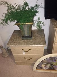 Two drawer end table has matching chest and dresser.