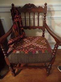 Antique chair upholstered in camel bags