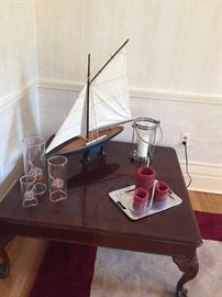 Coffee table, boat, oil lanterns, candles and more