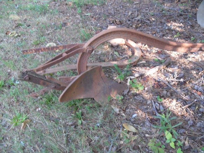 Several Old Horse Drawn Plows