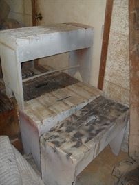 Well used work stools that double as a tools box