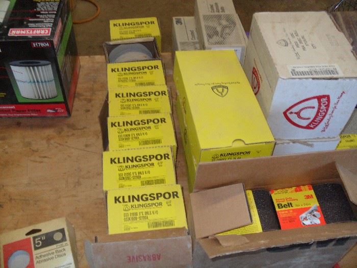 Boxes of sanding disc, sanding belts and sanding paper